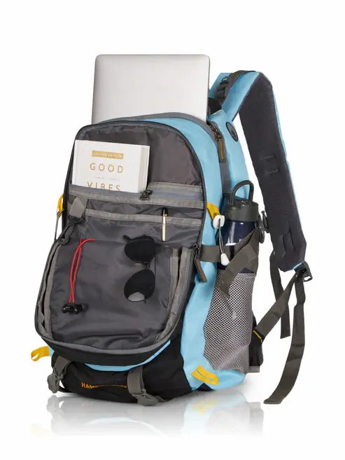 Backpack with compartments and items on a white background