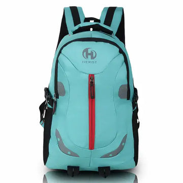 Light blue backpack with red zipper and black straps on a white sea green laptop backpack 28L water resistant office bag India background